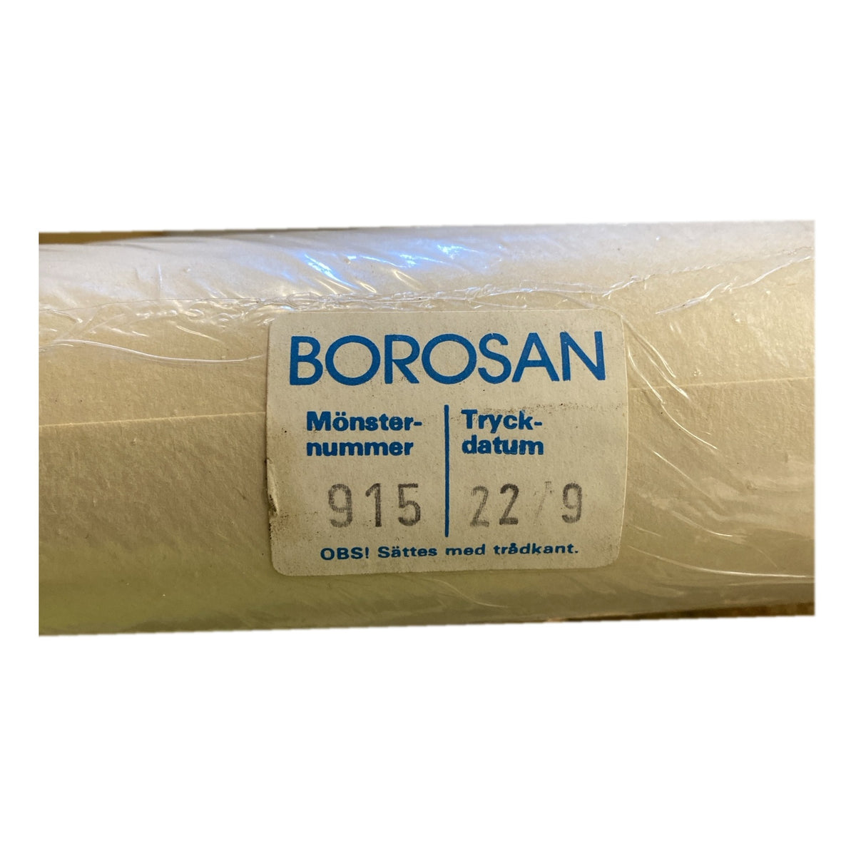 Tapetrulle Borosan 915 etikett med tryckdatum 22/9