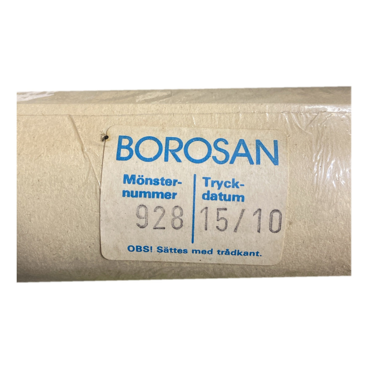 Tapetrulle Borosan 928 etikett med tryckdatum 15/10