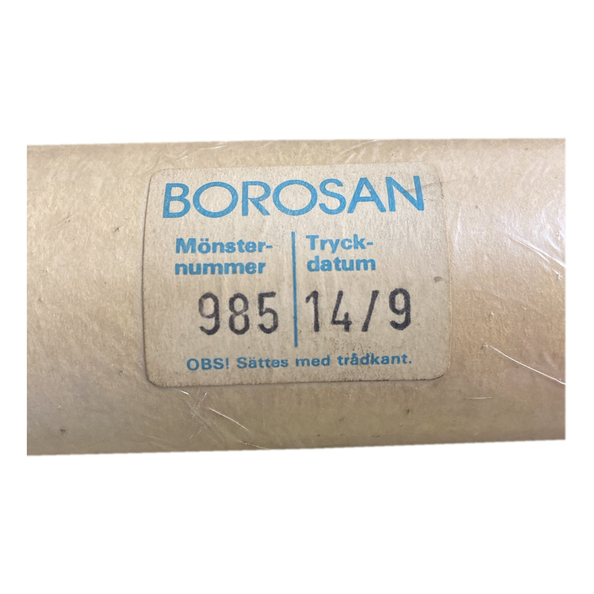 Tapetrulle Borosan 985 med etikett