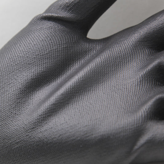 Detalj av arbetshandske Soft Touch Precision i nylon med tunn och slitstark struktur