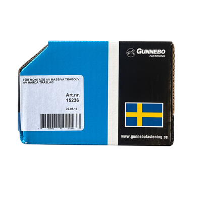 Baksida av Gunnebo Golv- och Sockelskruv-förpackning med information om massiva trägolv och artikelnummer 15236