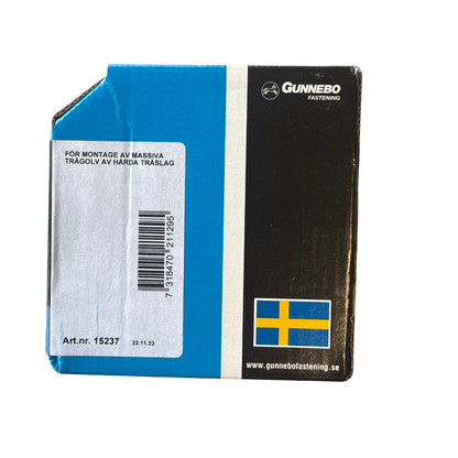 Baksida av Gunnebo Golv- och Sockelskruv-förpackning med information om massiva trägolv och artikelnummer 15237