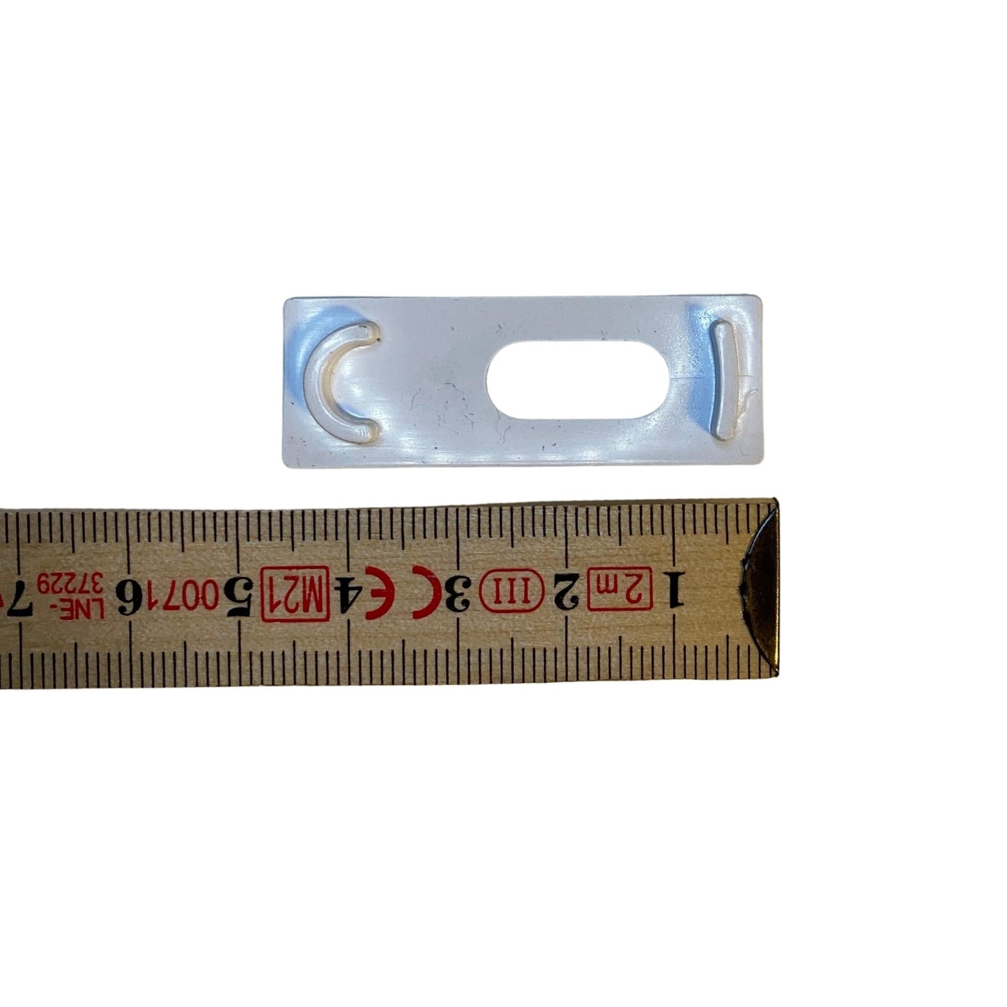 Distanskloss i plast 10x45mm med slits och krokfäste