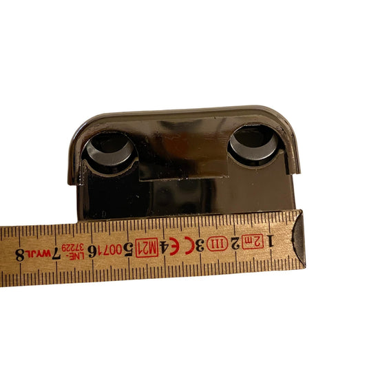 Förkromad rörklämma plast 65 mm