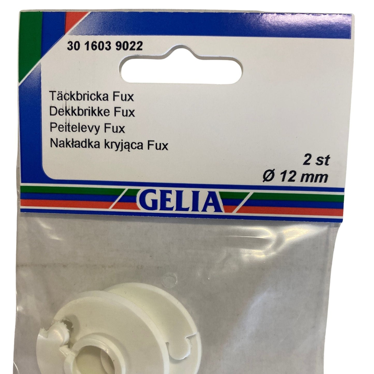 Närbild på förpackning för GELIA Täckbricka Fux 12 mm med produktinformation