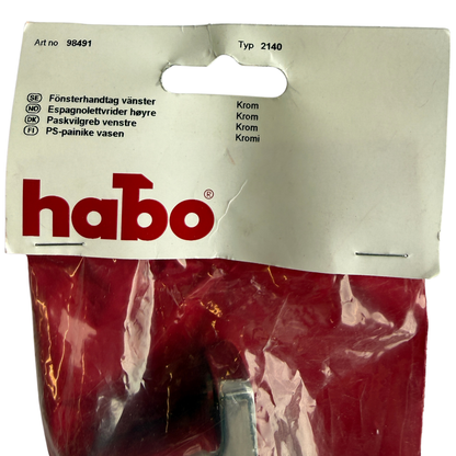 Framsida av förpackning med produktinformation för Habo fönsterhandtag vänster, artikelnummer 98491