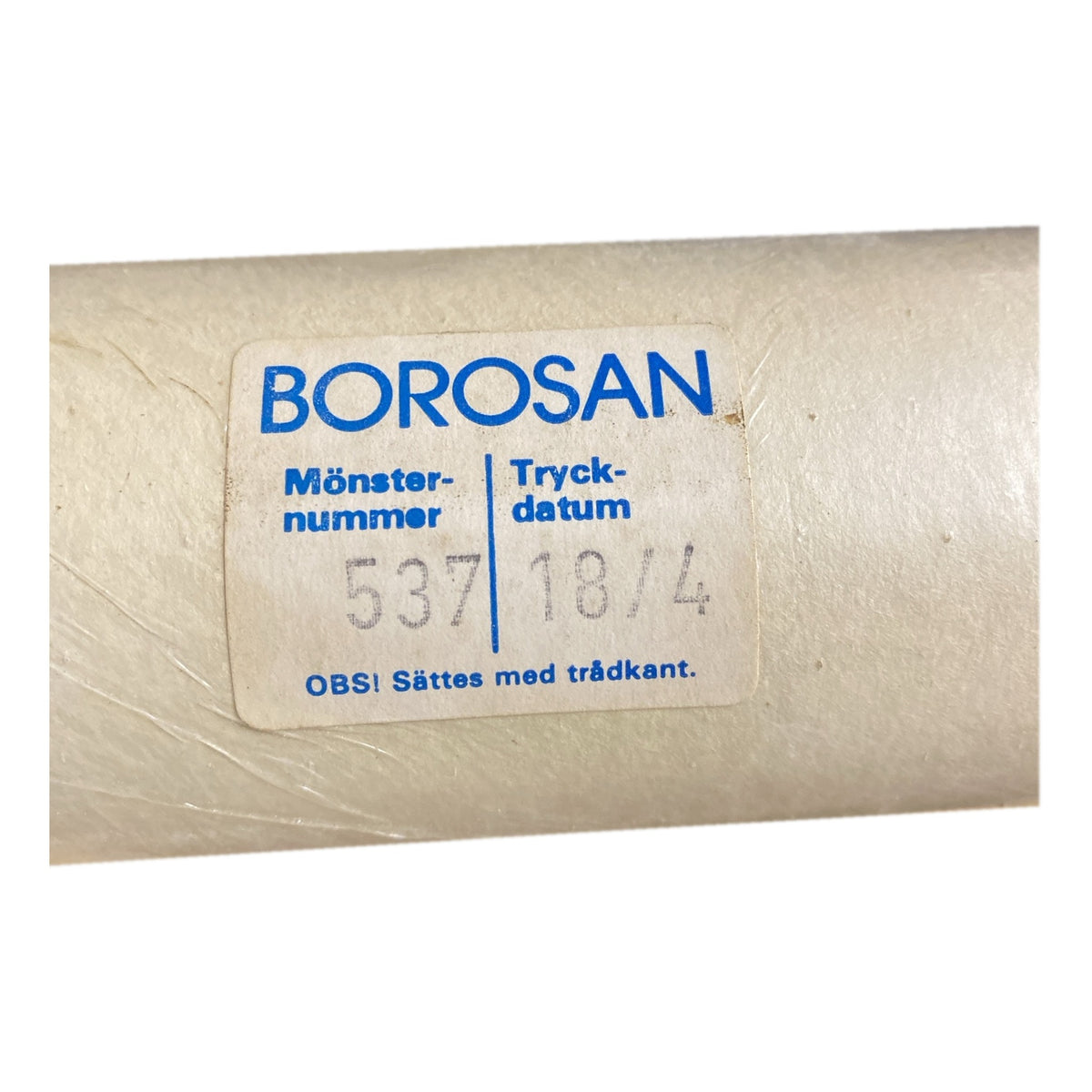 Tapetrulle Borosan 537 med etikett