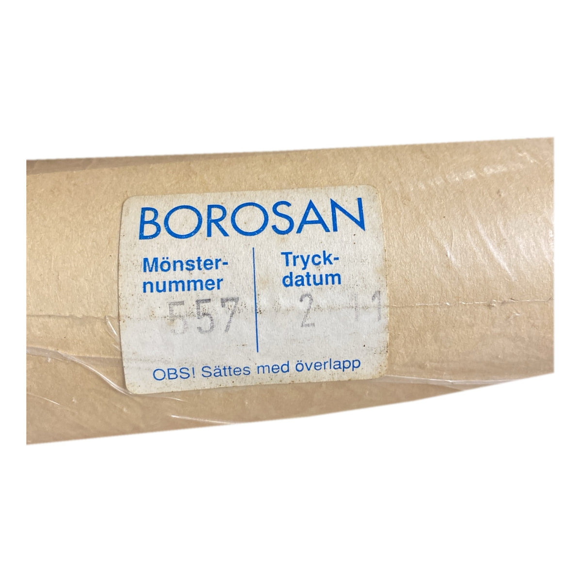 Tapetrulle Borosan 557 med etikett