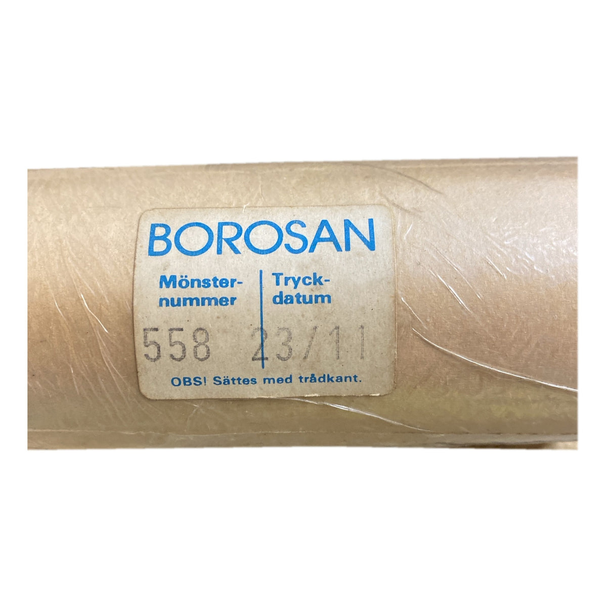Tapetrulle Borosan 558 med etikett