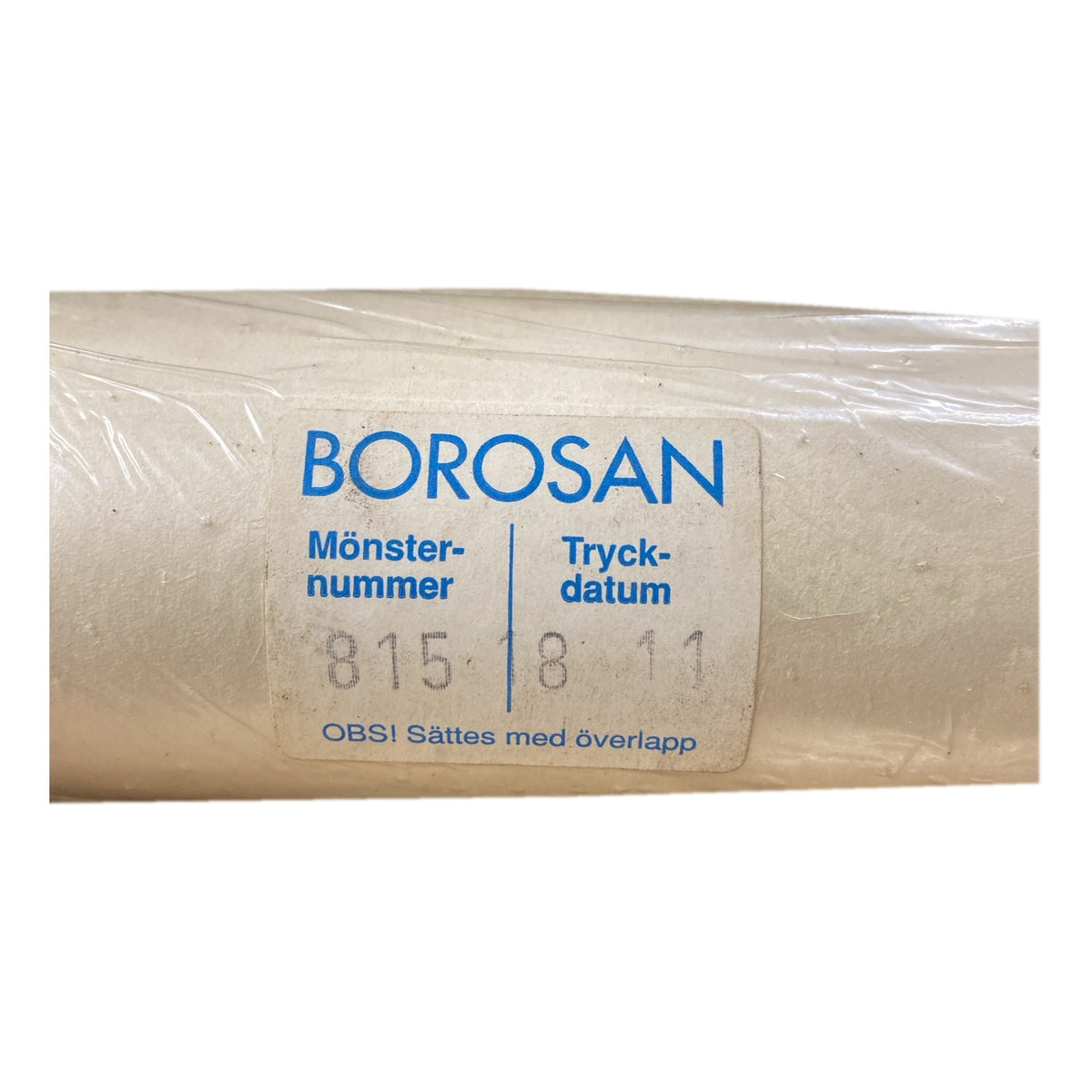 Tapetrulle Borosan 815 med etikett