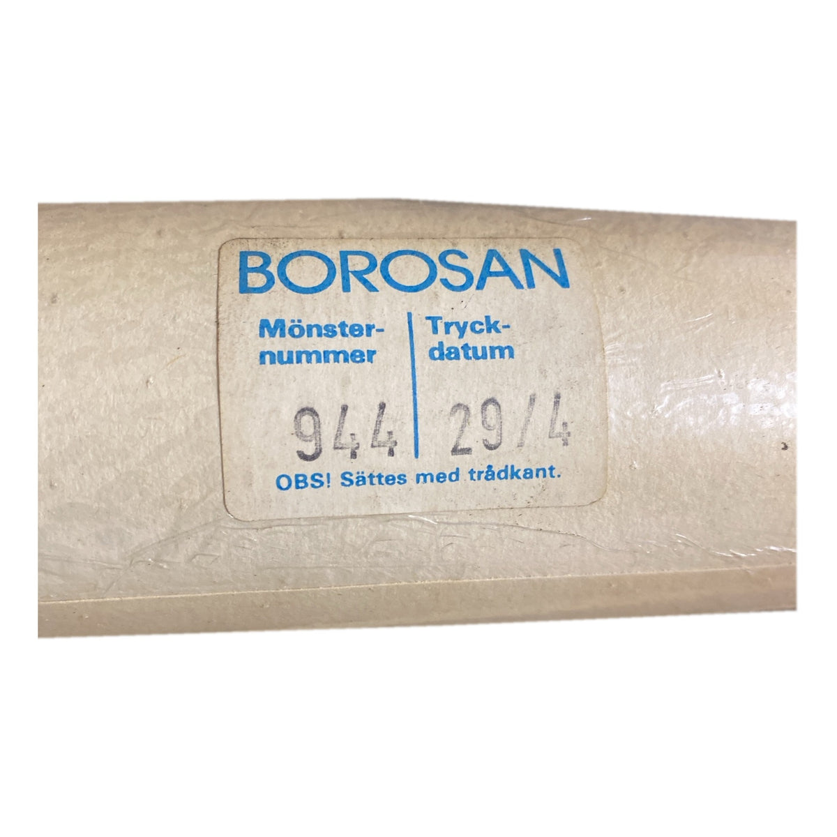 Tapetrulle Borosan 944 med etikett