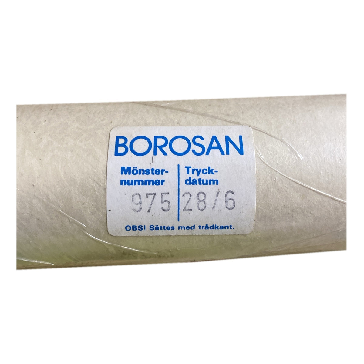 Tapetrulle Borosan 975 med etikett
