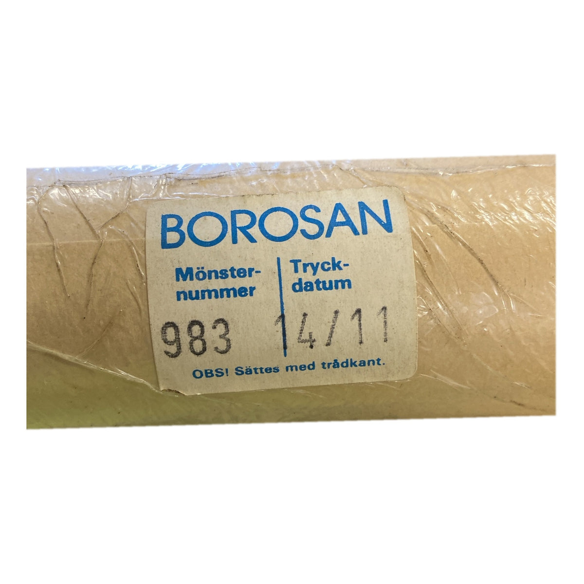 Tapetrulle Borosan 983 etikett med tryckdatum 14/11