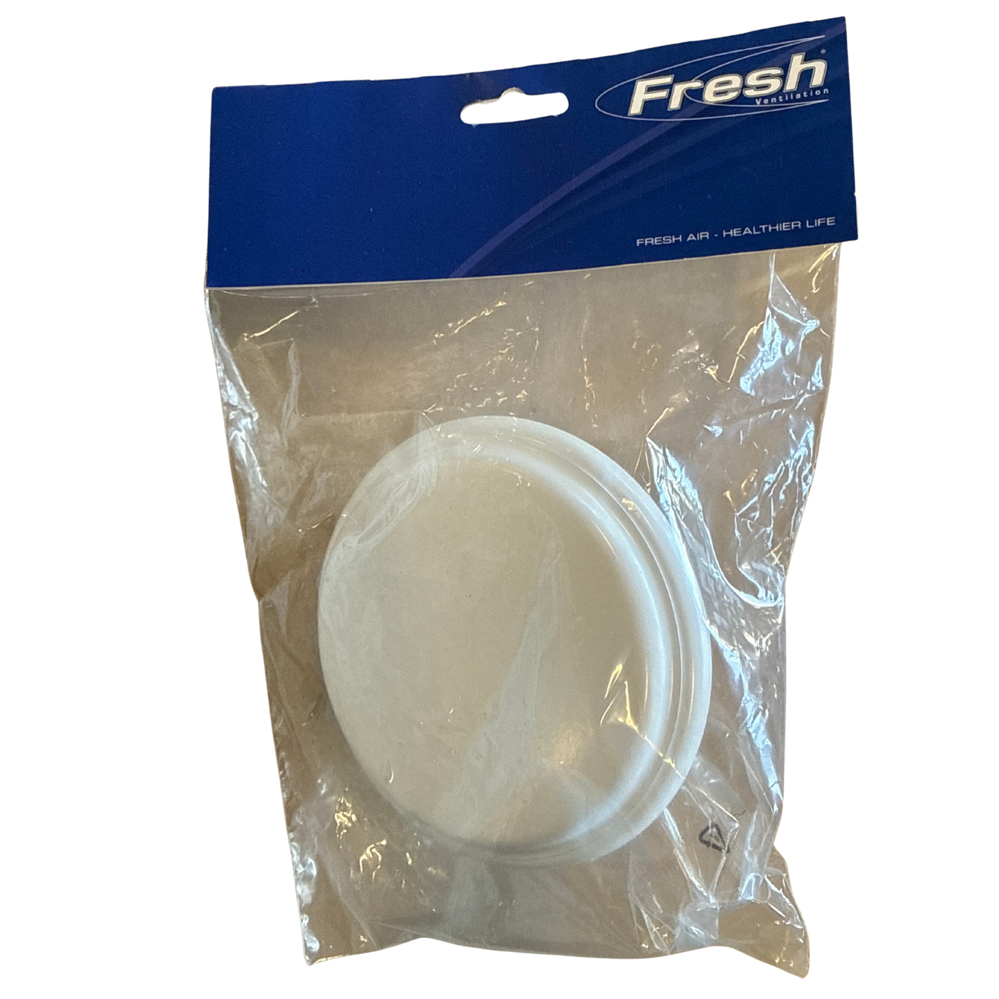 Rund vit tallriksformad luftventil i metall, synlig genom förpackningens plast