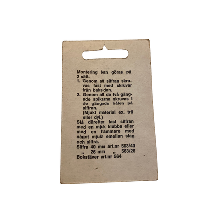 Monteringsanvisning på baksidan av förpackningen till hussiffra 4 från Habo med två monteringssätt