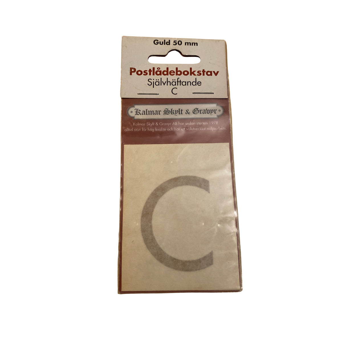 Postlådebokstav C i guldfärgad självhäftande vinylfolie 50 mm i originalförpackning