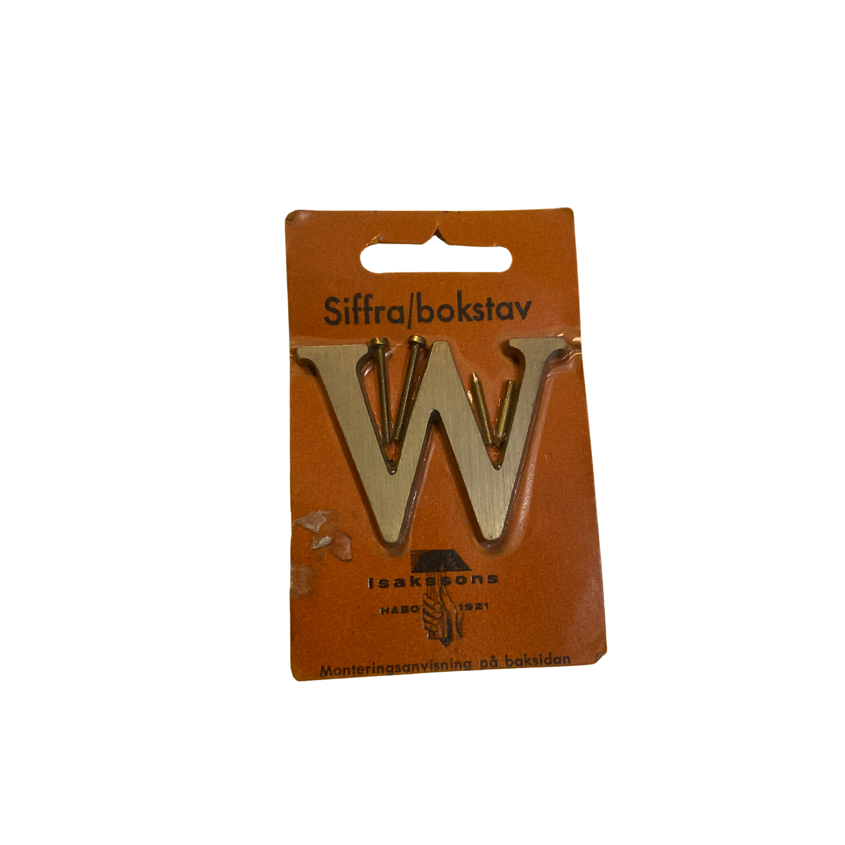 Husbokstav W med borstad mässingsfinish i oöppnad vintage blisterförpackning med skruvar och gängade spikar